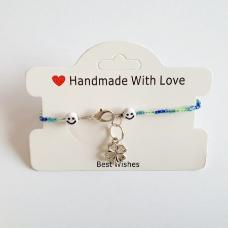 Armband - blauw met smiley en klavertje vier